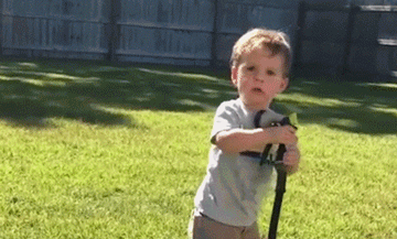 funny boy shoots face hose